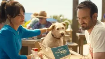 Merv: Zooey Deschanel and Charlie Cox and dog at beach.
