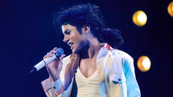 Michael movie: Jaafar Jackson as Michael Jackson, singing with a microphone