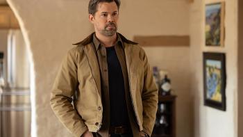 Miss You, Love You: Andrew Rannells stands in a house with his hands in his pockets