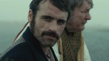 Monster: Dara Devaney stands on shore and looks