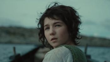 Monster:  Saise Ni Chuinn sits in boat