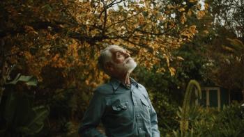 Moon Manor Movie: Jimmy (James Carrozo) stands near a tree and gazes up at the sky
