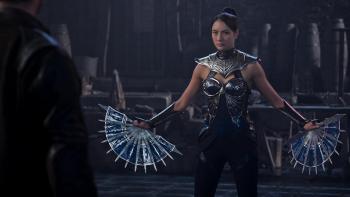 Mortal Kombat II Movie: Princess Kitana (Adeline Rudolph) raises her bladed fans in preparation for a tournament