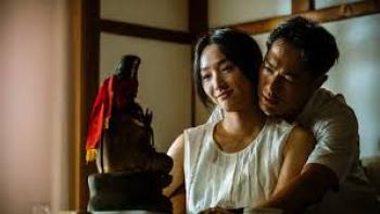 Mudborn Movie: Asian man hugs an Asian woman from behind