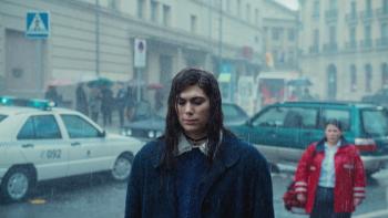 My Dearest Señorita: A woman walks in the rain.