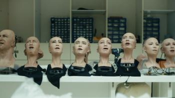 My Robot Sophia movie: 10 robot heads are lined up across a table 