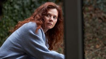 My Sister's Bones: Anna Friel leans on a railing with flecks of blood on her face