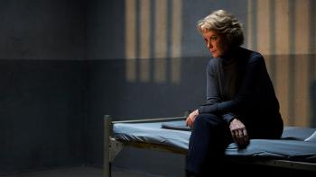 My Sister's Bones: Jenny Seagrove sits on a bed in a dimly-lit prison cell
