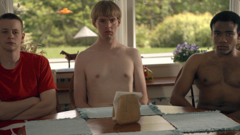 Mystery Team movie: Charlie, Duncan, and Jason sit around a kitchen table, two of them shirtless