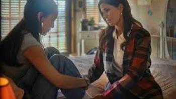 Nobody Dumps My Daughter: Daughter and mother talk on a bed