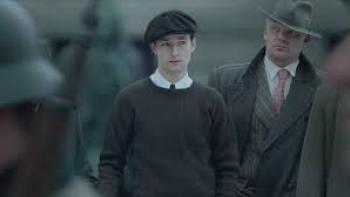 Number 24 movie: White man in hat next to another man 