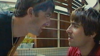 Oasis—Supersonic: rockstar brothers from Oasis Liam and Noel Gallagher look at each other intensely