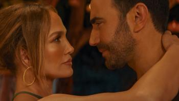 Office Romance: Jennifer Lopez and Brett Goldstein embrace.