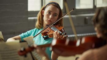 On Chesil Beach Movie: Florence Ponting playing violin