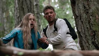 One Mile: Chapter One movie: Amelie Hoeferle gasps as Ryan Phillippe holds her arm