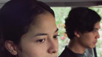 One Night Stand: In car Indonesian woman left looks sad while Indonesian man right also looks sad