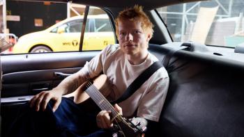One Shot with Ed Sheeran: With his guitar in the back of a cab.