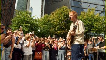 One Shot with Ed Sheeran: Sheeran performs for a crowd outside.