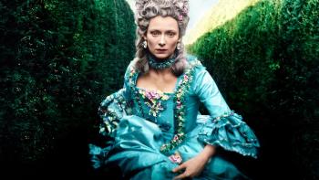 Orlando: Tilda Swinton runs through an ornate garden wearing a formal blue dress