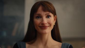 Other Mommy movie: Other Mommy (Jessica Chastain) holds a pained smile while tears form