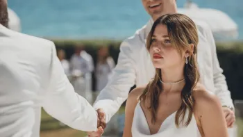 Our Fault: Nicole Wallace dressed in white.