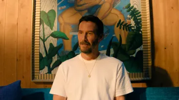 Outcome: Keanu Reeves in a white t-shirt.