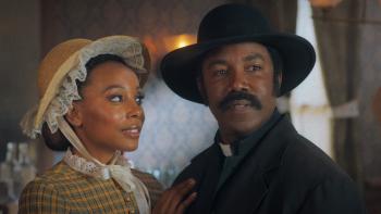 Outlaw Johnny Black Movie: Erica Ash looks lovingly at Michael Jai White