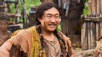 Panda Plan 2: The Magical Tribe Movie: Would-be assassin Shan Qiang (Shan Qiao) wears braids in his hair and smiles