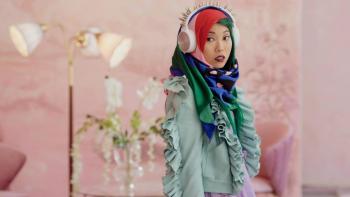 Paradise Hills Movie: Yu stands in a lush pink living room