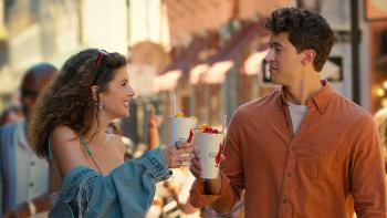 People We Meet on Vacation: Emily Bader and Tom Blyth celebrate in the street.