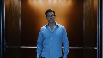 PH-1 movie: Mark Kassen stands in an elevator as the doors open