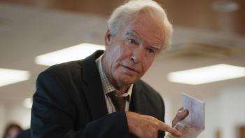 The Last Rifleman Movie: Pierce Brosnan pointing to a piece of paper