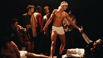 Postcards from London: Harris Dickinson poses in a white loin cloth to recreate a Caravaggio painting with seven other men