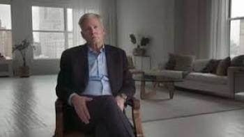 Predators Movie: White man sits in chair