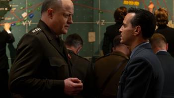 Pressure Movie: Gen. Dwight D. Eisenhower (Brendan Fraser) and BAF meteorologist James Staff (Andrew Scott) talk in a war strategy room