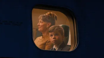Propeller One-Way Night Coach: Looking out an airplane window.
