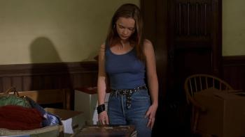 Prozac Nation: Christina Ricci stands in a badly lit room looking down at a pile of records