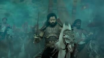 Ponniyin Selvan -- Part II: A character advances in battle with a sword on a horse
