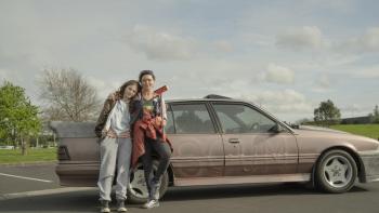 The Justice of Bunny King: Essie Davis and Thomasin McKenzie leaning against a car