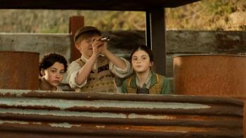 Railway Children: Child with a telescope