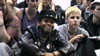 Rebel Dykes: A group of women sit together during a debate.