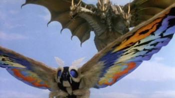Rebirth of Mothra III Movie: Fantasy creatures, a colorful giant moth and a dragon, against a blue sky.
