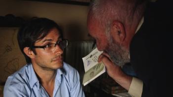 Maziar Bahari is being interrogated and threatened.