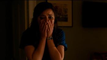 The Ruse Movie: A terrified Dale holds her hands to her face as if to stifle a scream