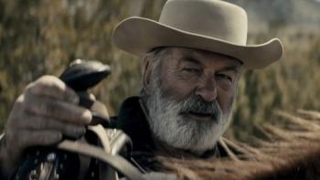 Rust Movie: Harland Rust (Alec Baldwin) adjusts a saddle