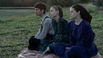 Women Talking: Ben Whishaw, Claire Foy, and Jessie Buckley gaze to the left