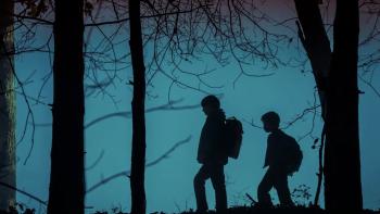 Salem's Lot: Two children walk through a wood at dusk