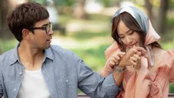 Same Day with Someone: Asian woman examines Asian man's hands