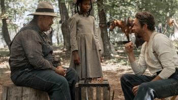 Sarah's Oil movie: Naya Desir-Johnson stands talking to Zachary Levi and Mel Rodriguez