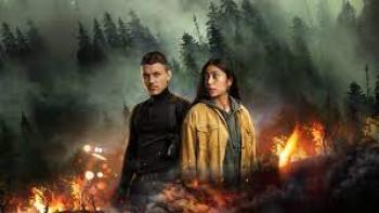 Sayen Movie Scene 2: A man and woman stand as a fire burns